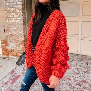 RUST POPCORN-SLEEVE KNIT CARDIGAN